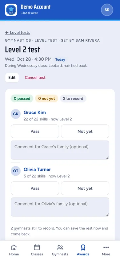 A coach entering test results on a phone